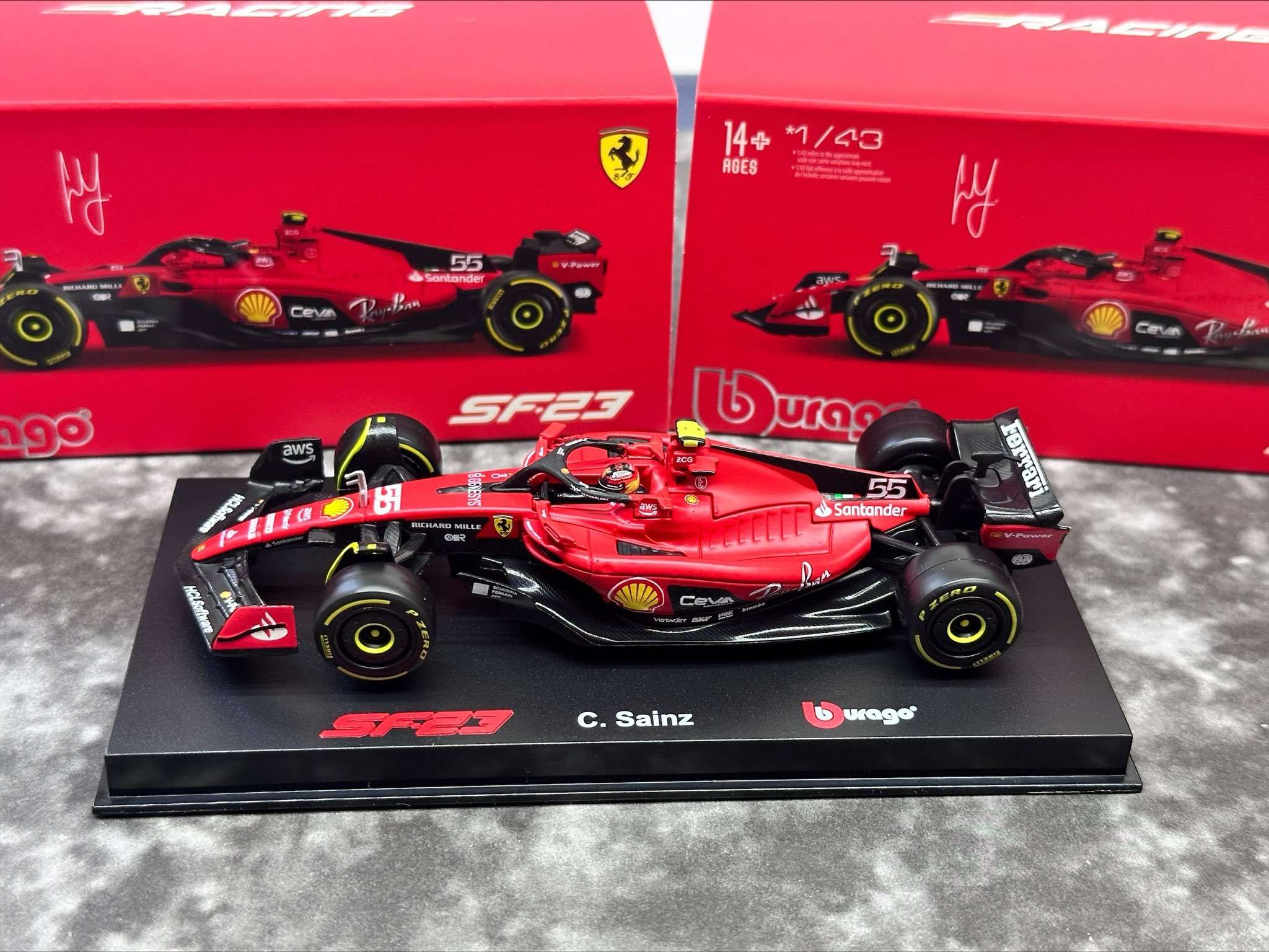 Ferrari F1 #55 CARLOS SAINZ SEASON CAR 2023 WITH HELMET (Hardcase) /Bburago 36835S 1:43/